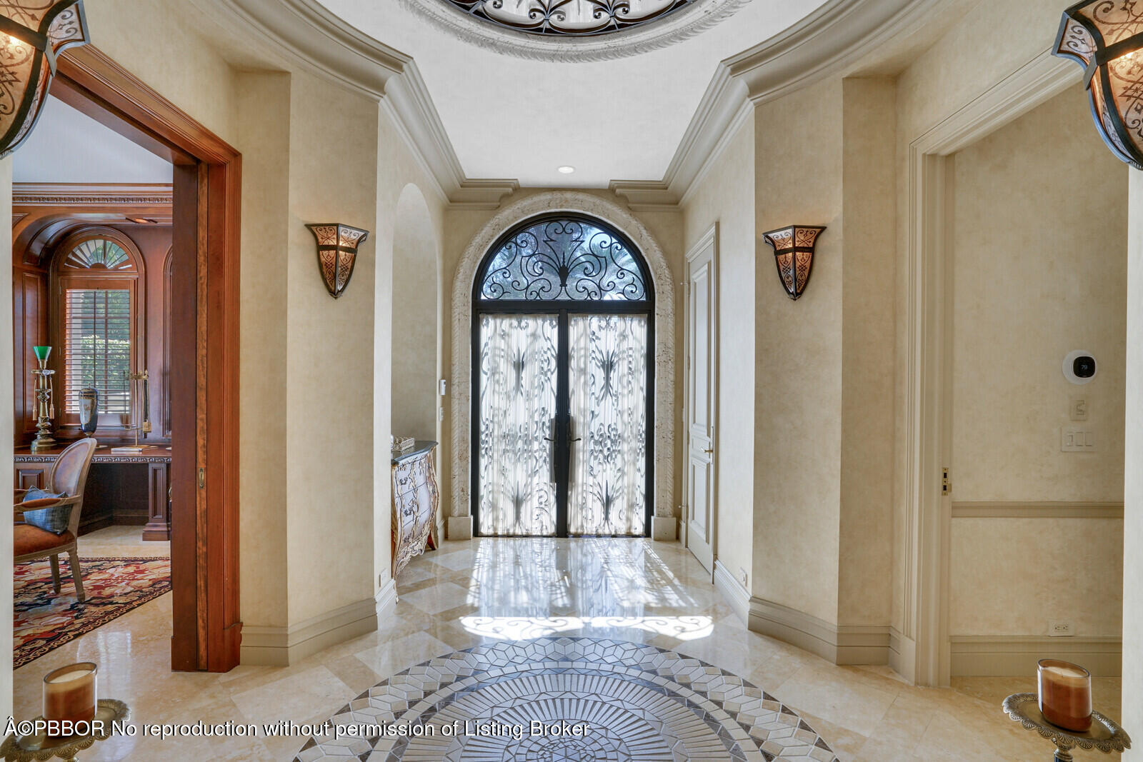 231 Wells Road Palm Beach, FL 33480 - Photo 3 of 39 a view of an entryway with wooden floor