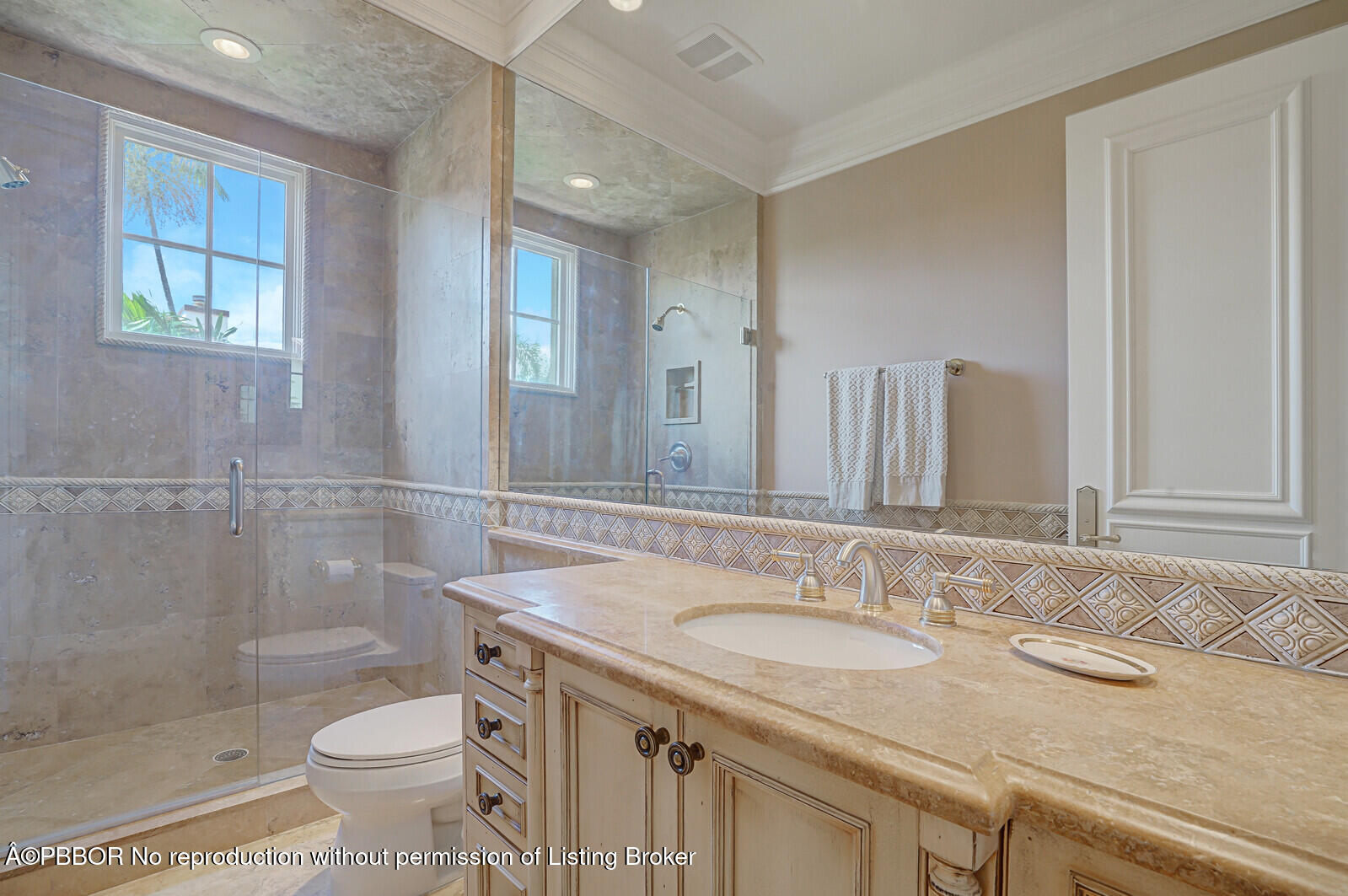 231 Wells Road Palm Beach, FL 33480 - Photo 36 of 39 a bathroom with a granite countertop sink toilet and shower