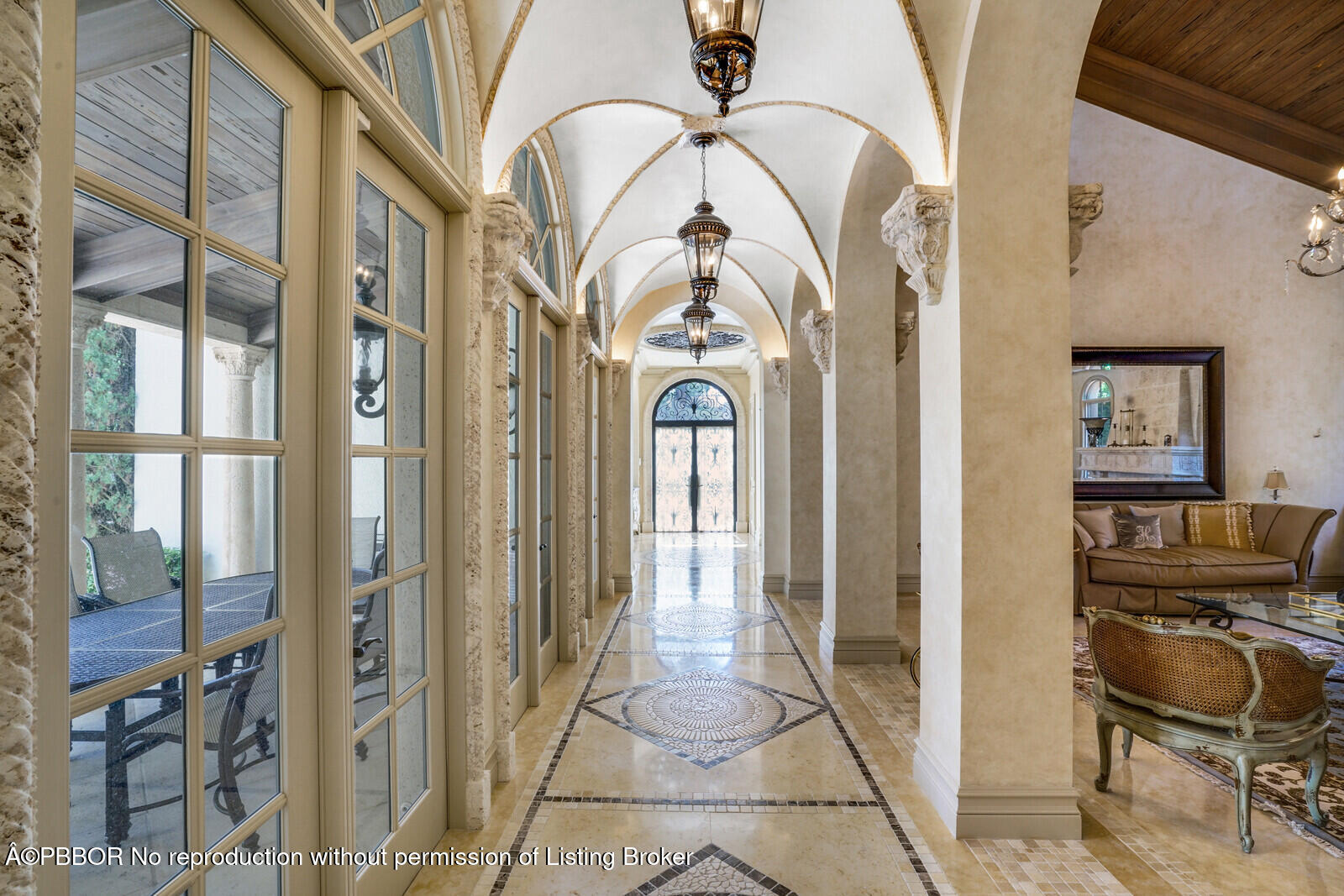 231 Wells Road Palm Beach, FL 33480 - Photo 7 of 39 a view of an entryway with a chandelier