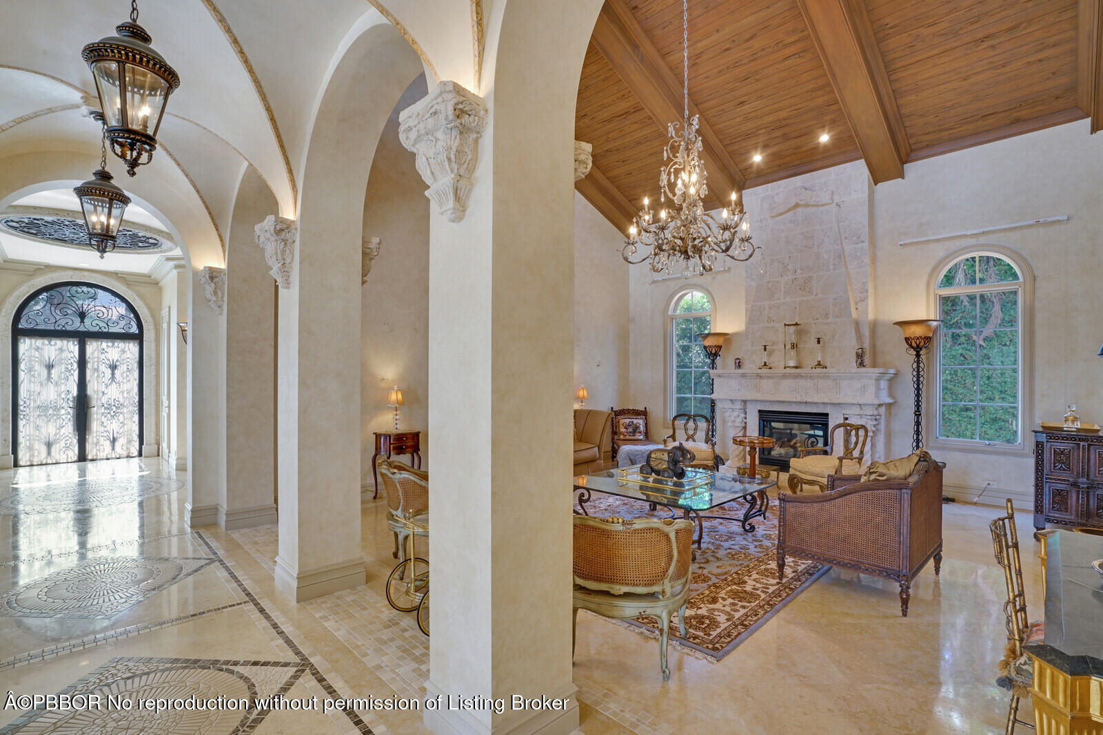 231 Wells Road Palm Beach, FL 33480 - Photo 8 of 39 a living room with fireplace furniture and a chandelier