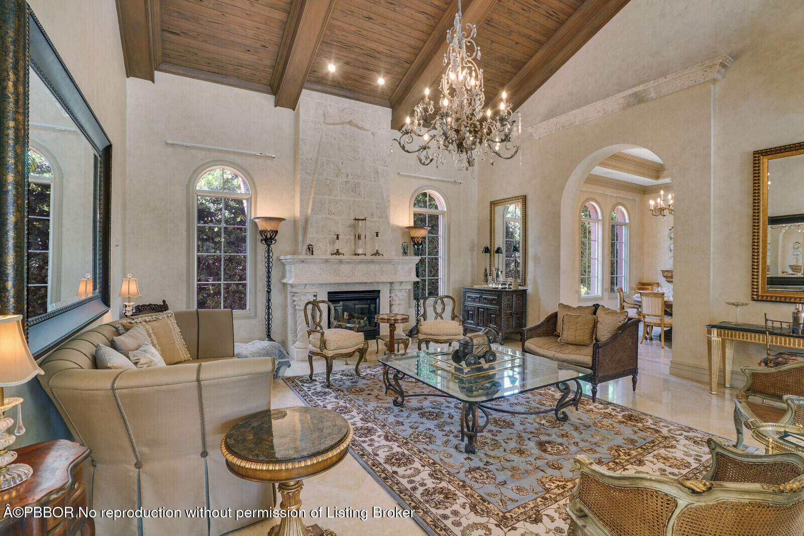 231 Wells Road Palm Beach, FL 33480 - Photo 10 of 39 a living room with fireplace furniture and a chandelier