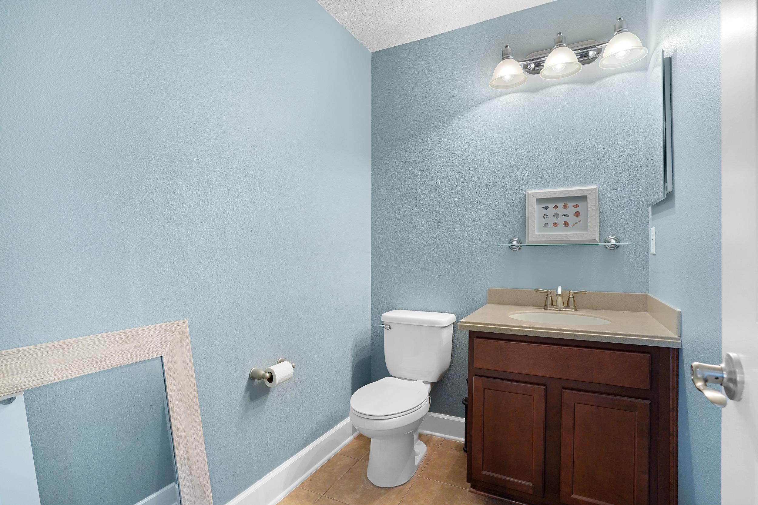 1308 Acorn Ridge Court St. Augustine, FL 32092 - Photo 38 of 47 a bathroom with a sink vanity mirror and toilet