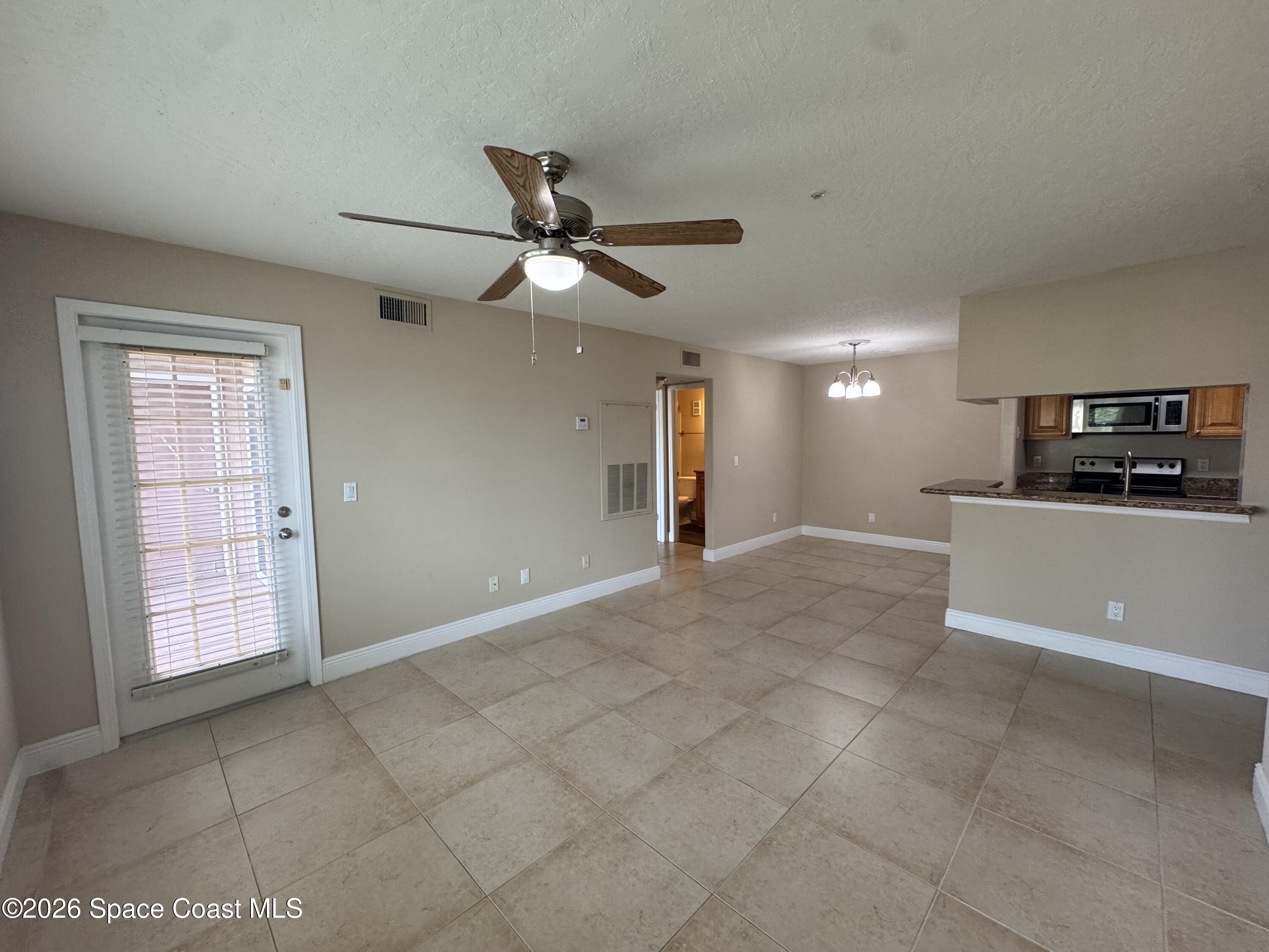 7667 North Wickham Road, Unit 416 Melbourne, FL 32940 - Photo 9 of 23 IMG_7218