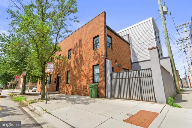 front view of a house with a street