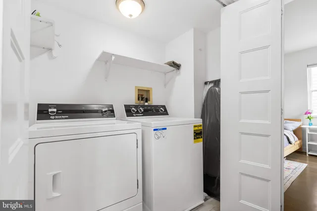 a utility room with dryer and washer