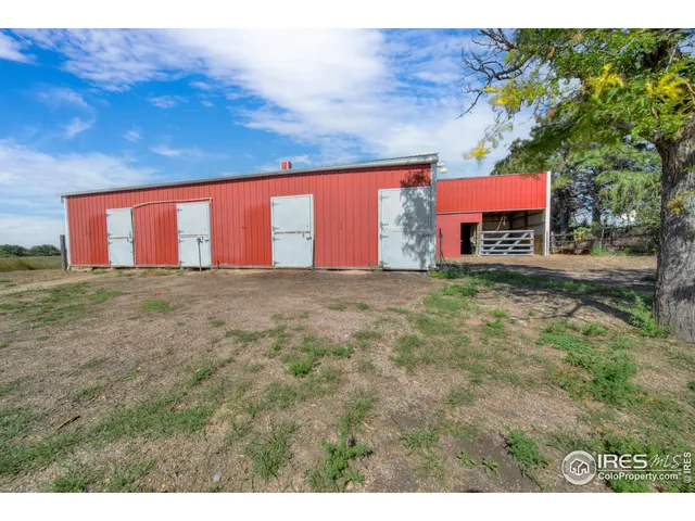 a building view with a big yard