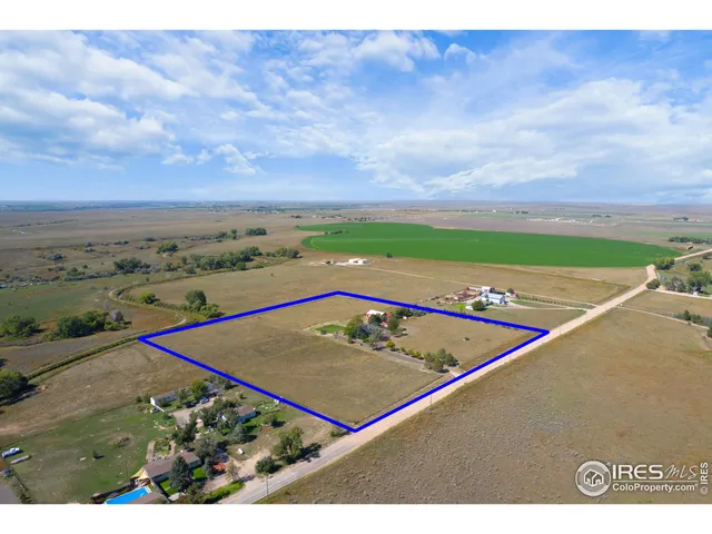 a view of lake with green space