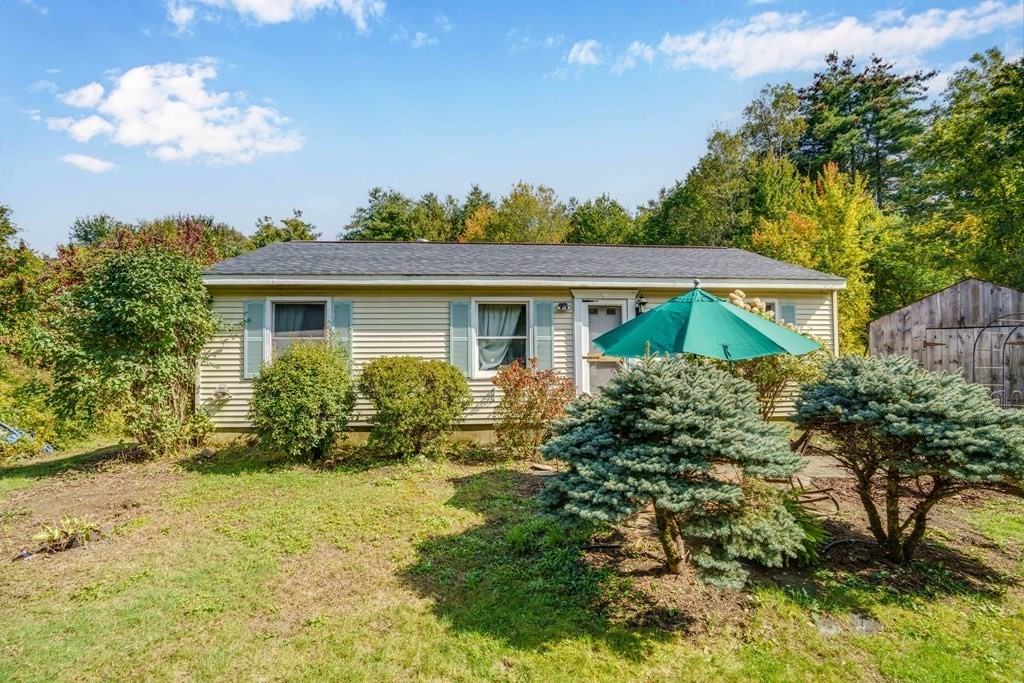 229 Osborne Road Ware, MA 01082 - Photo 1 of 28 a front view of house with yard and green space