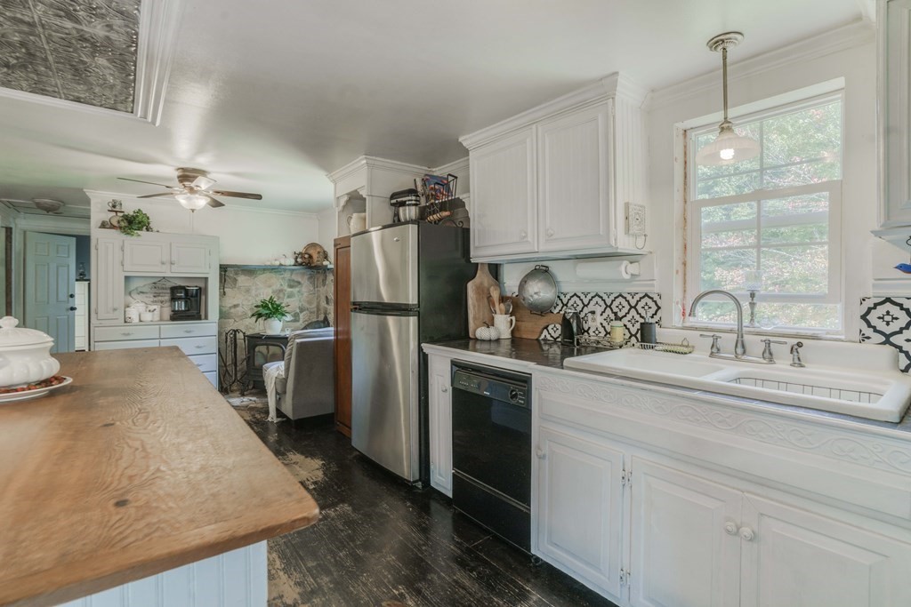 229 Osborne Road Ware, MA 01082 - Photo 17 of 28 a kitchen with refrigerator and cabinets