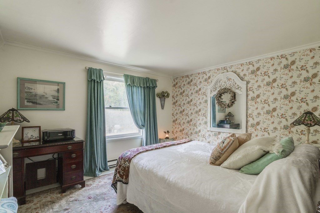 229 Osborne Road Ware, MA 01082 - Photo 22 of 28 a bedroom with a bed and a window
