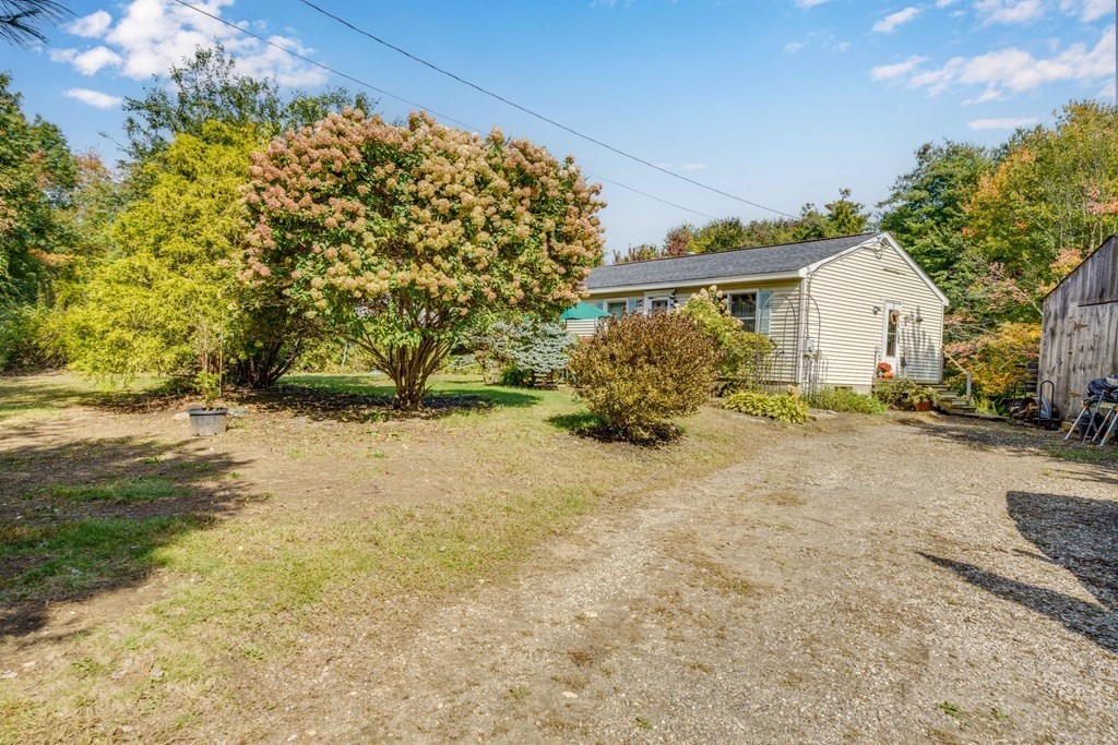 229 Osborne Road Ware, MA 01082 - Photo 5 of 28 a view of a house with a yard