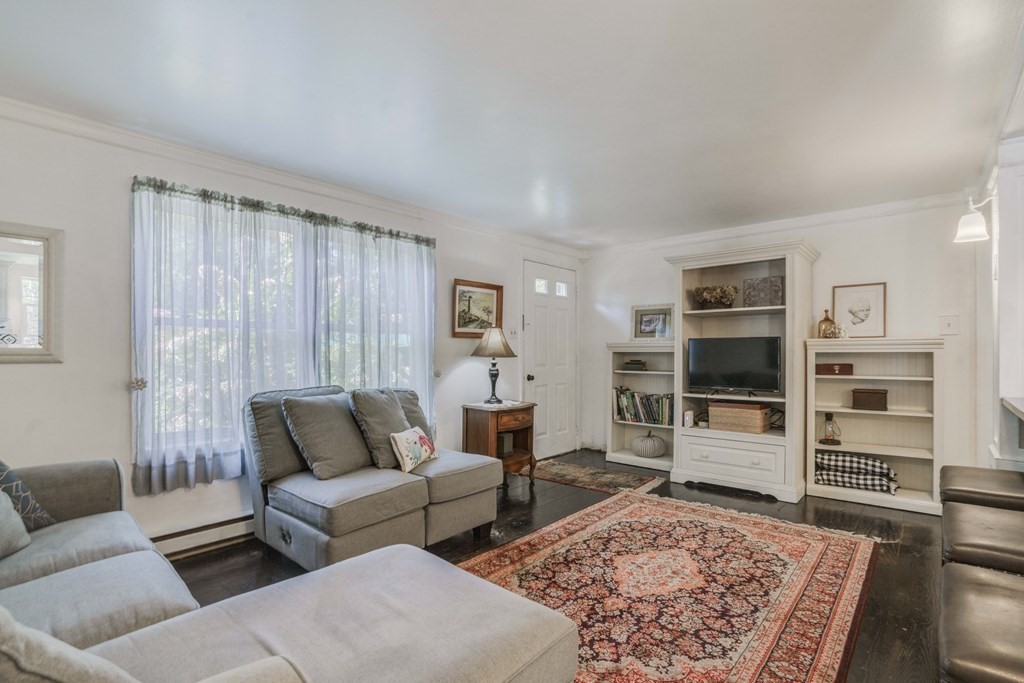 229 Osborne Road Ware, MA 01082 - Photo 9 of 28 a living room with furniture and a rug