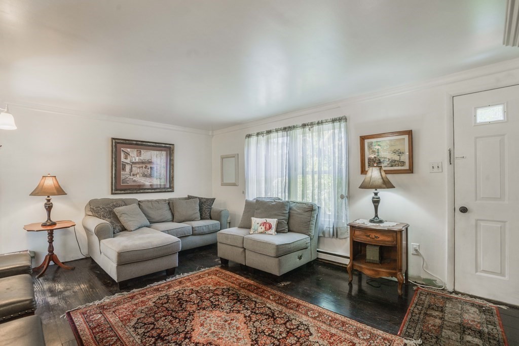 229 Osborne Road Ware, MA 01082 - Photo 10 of 28 a living room with furniture and a window