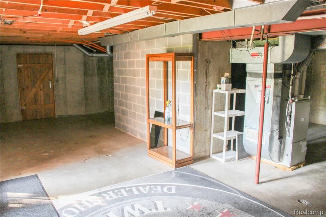 4165 Morgan Road Lake Orion, MI 48359 - Photo 62 of 81 Great walk out basement with lots of storage space or finish it for even more living space.