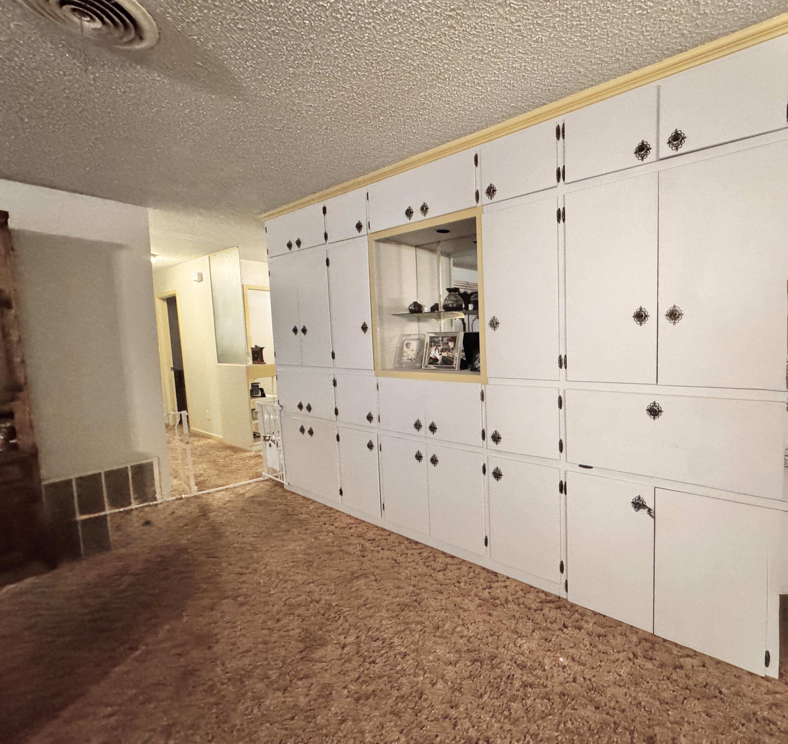 1720 Canyon Plainview, TX 79072 - Photo 15 of 49 a view of a storage & utility room with closet