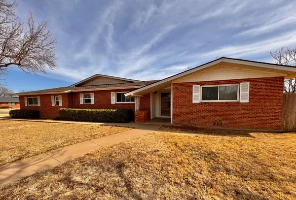 a front view of house with yard