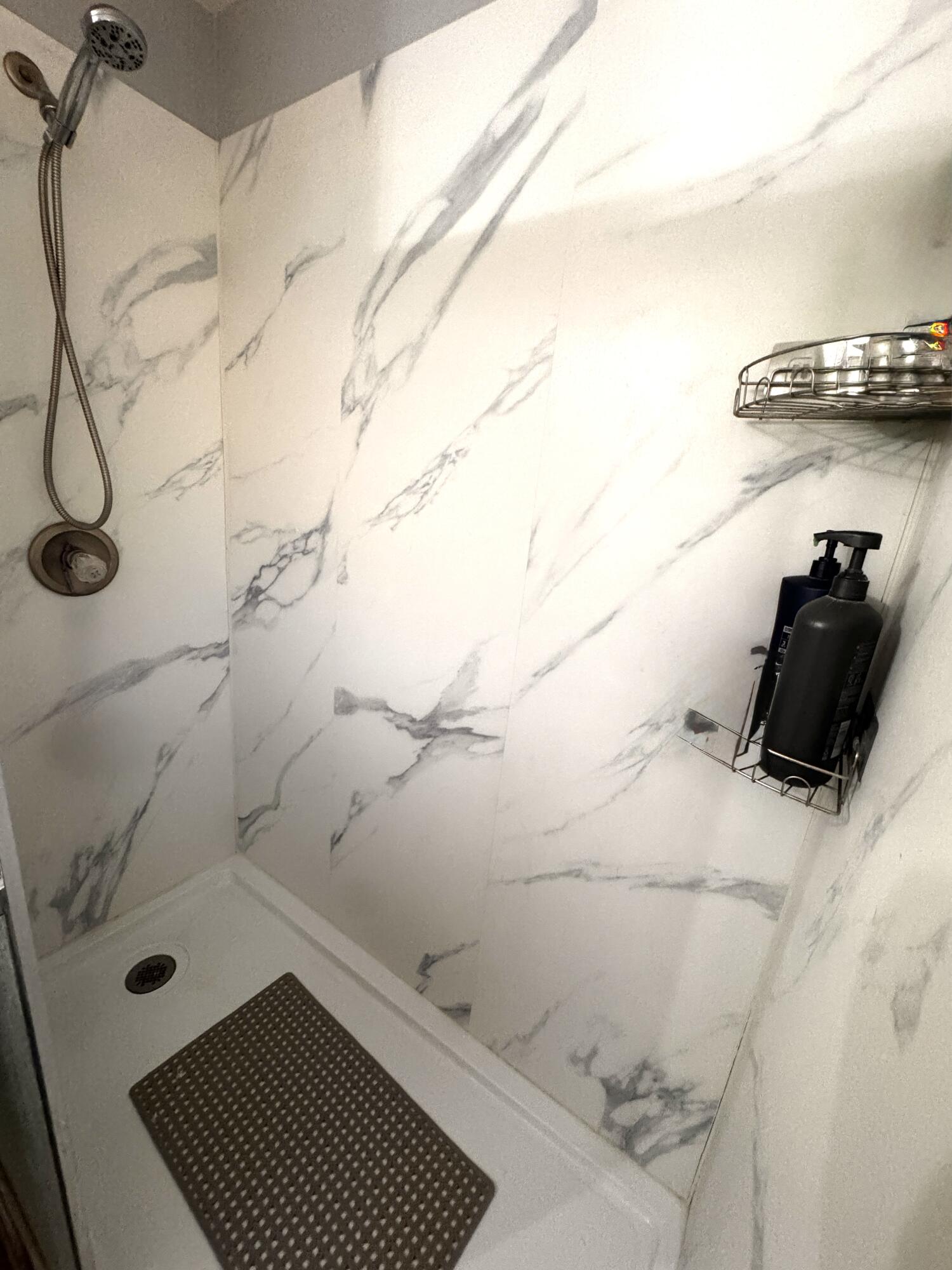 1720 Canyon Plainview, TX 79072 - Photo 32 of 49 a bathroom with a shower