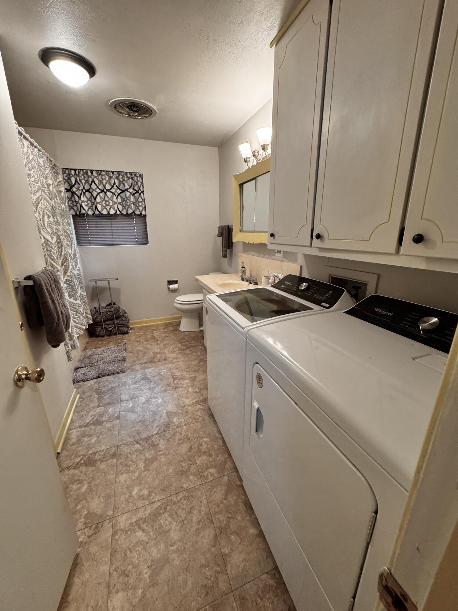 1720 Canyon Plainview, TX 79072 - Photo 33 of 49 a room with storage and utility