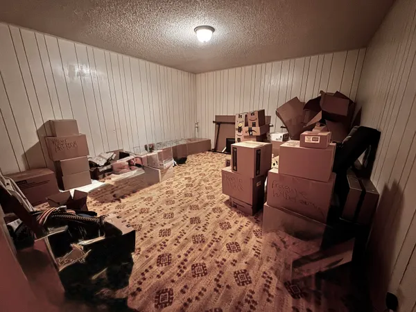 a workspace with furniture and a window