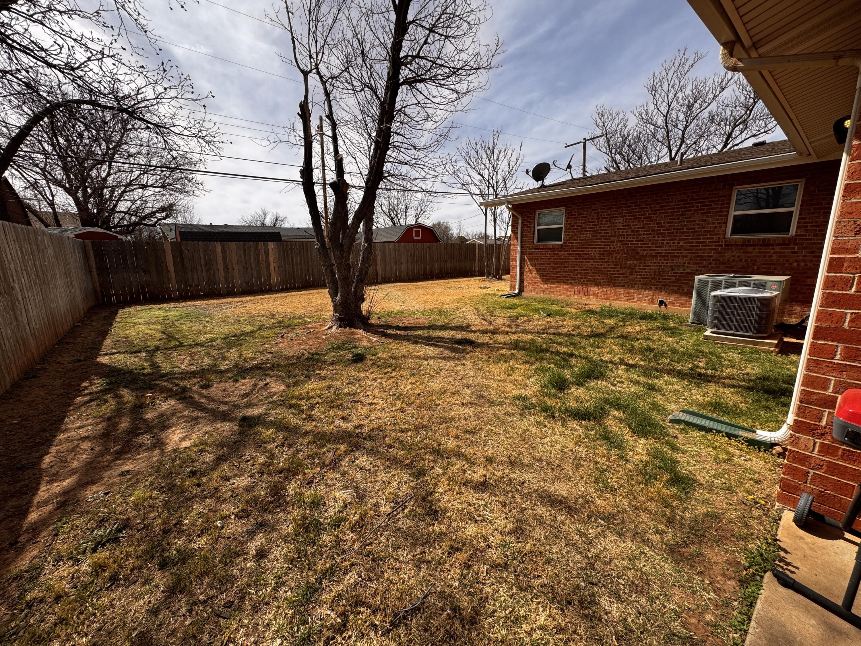 1720 Canyon Plainview, TX 79072 - Photo 45 of 49 a view of a backyard of the house