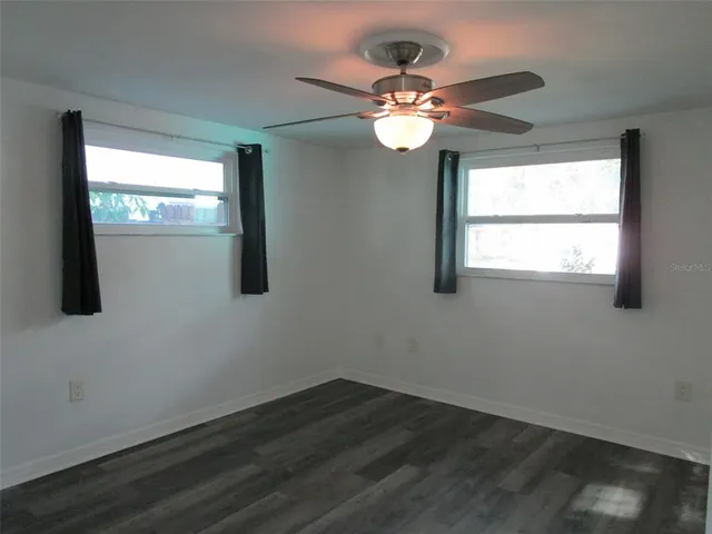 a view of a livingroom with a fan