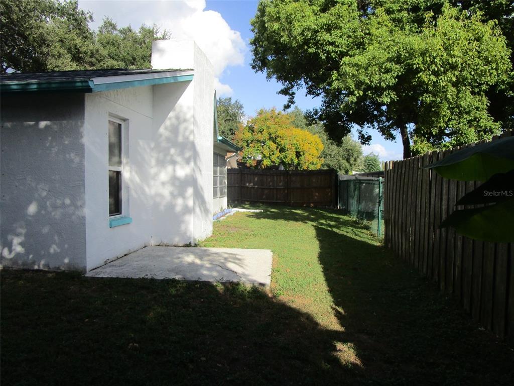 7226 San Moritz Drive Port Richey, FL 34668 - Photo 34 of 38 a view of a back yard of the house
