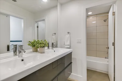 a bathroom with a sink and a bathtub