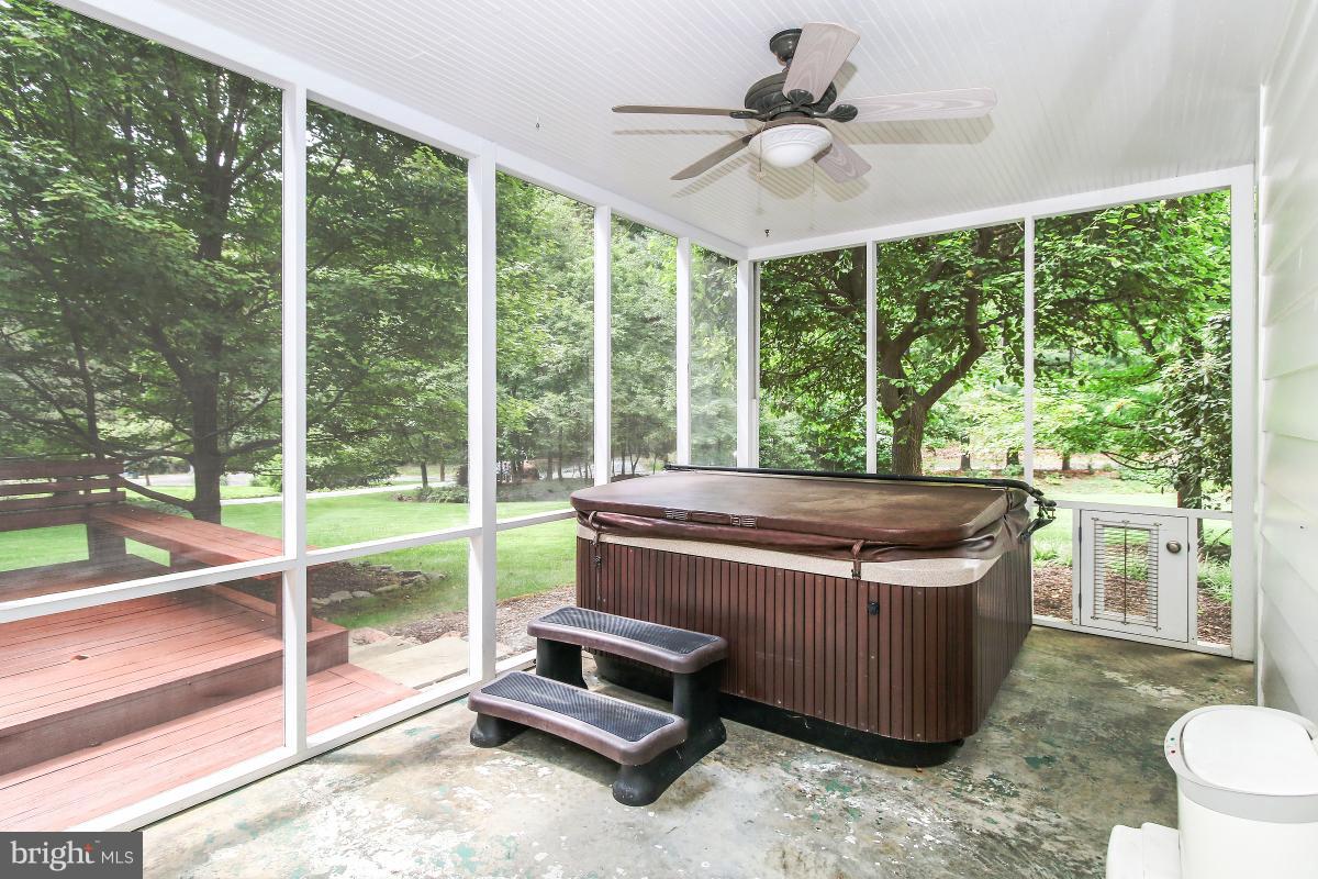 801 Midland Road Silver Spring, MD 20904 - Photo 26 of 30 Screened porch with hot tub