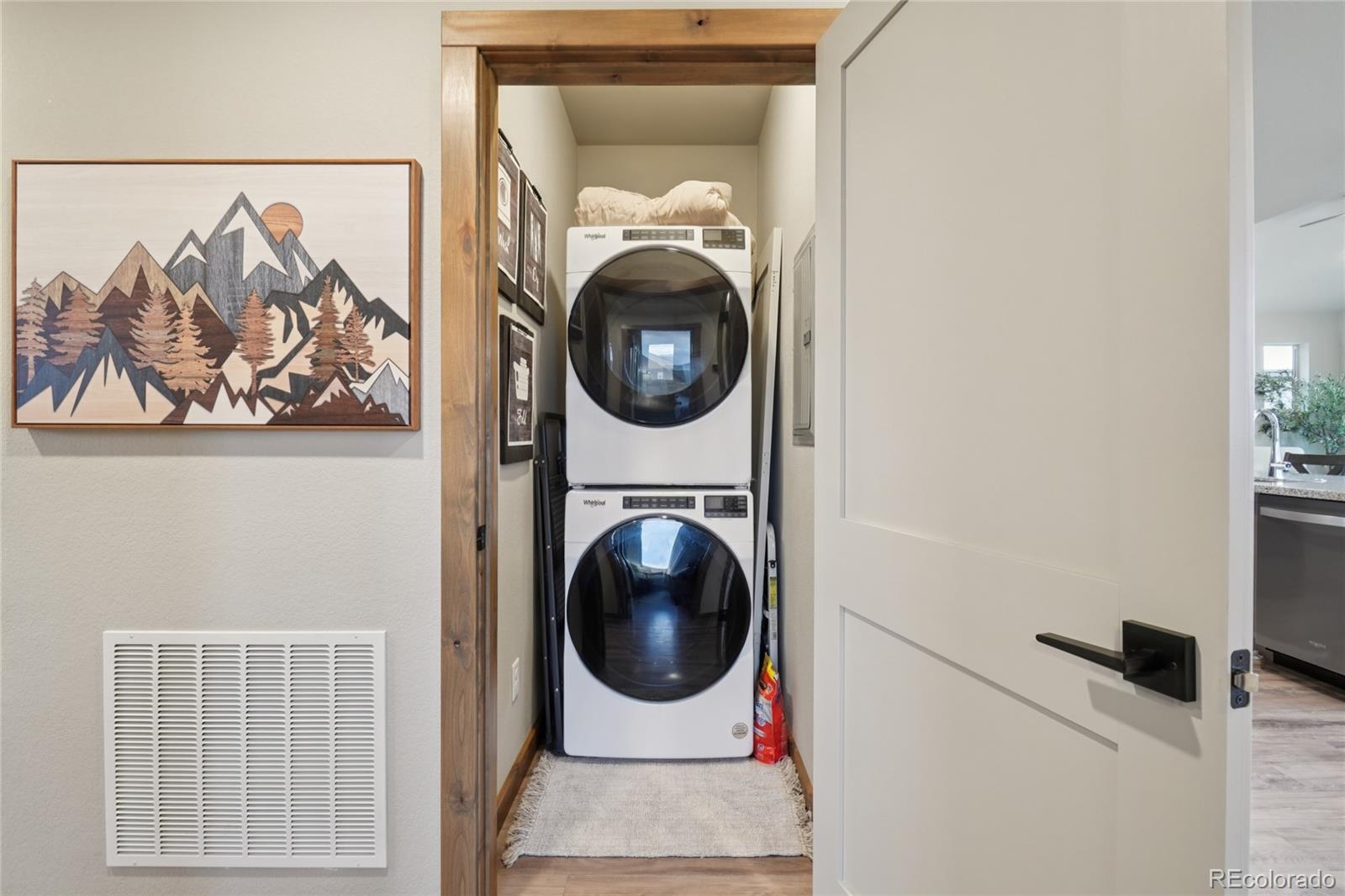 1700 Wildfire Road, Unit 301 Estes Park, CO 80517 - Photo 18 of 38 a utility room with dryer and washer