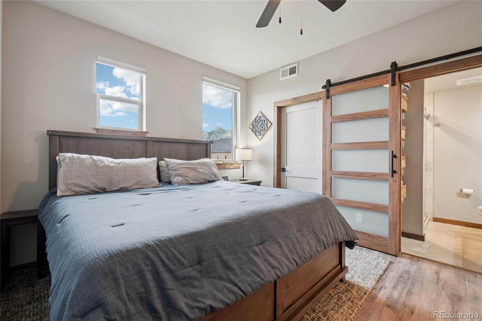 1700 Wildfire Road, Unit 301 Estes Park, CO 80517 - Photo 20 of 38 a bedroom with a bed and a window