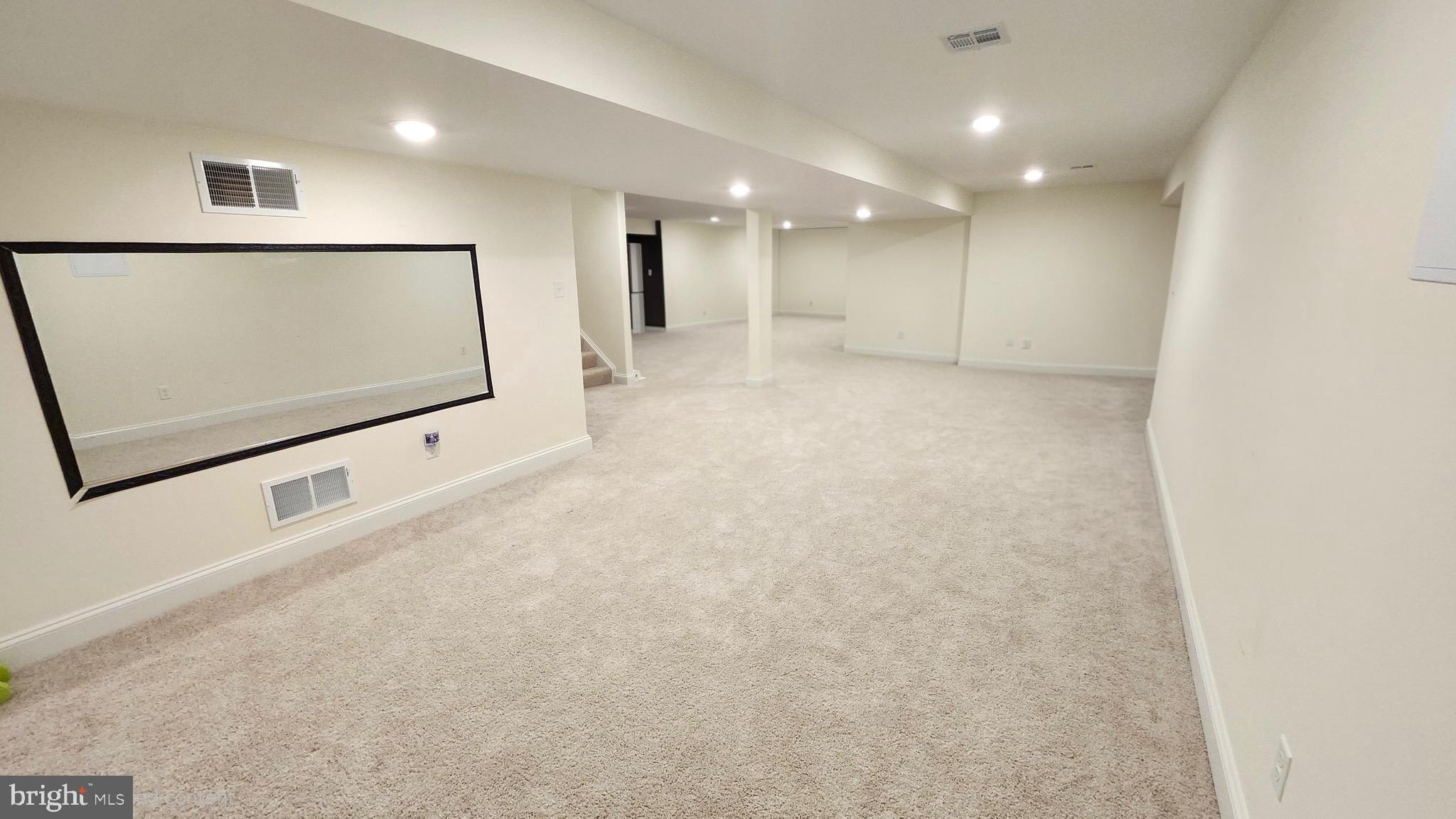 2510 Somerset Road Chambersburg, PA 17202 - Photo 25 of 32 a view of an empty room with wooden floor