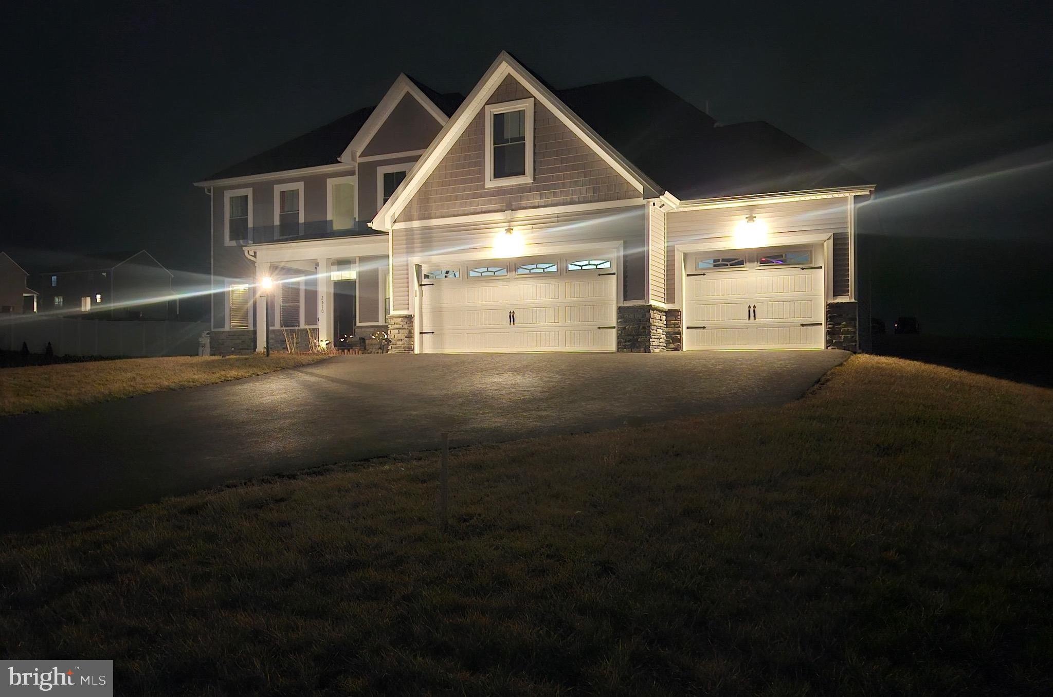 2510 Somerset Road Chambersburg, PA 17202 - Photo 27 of 32 a front view of a house with a yard and garage