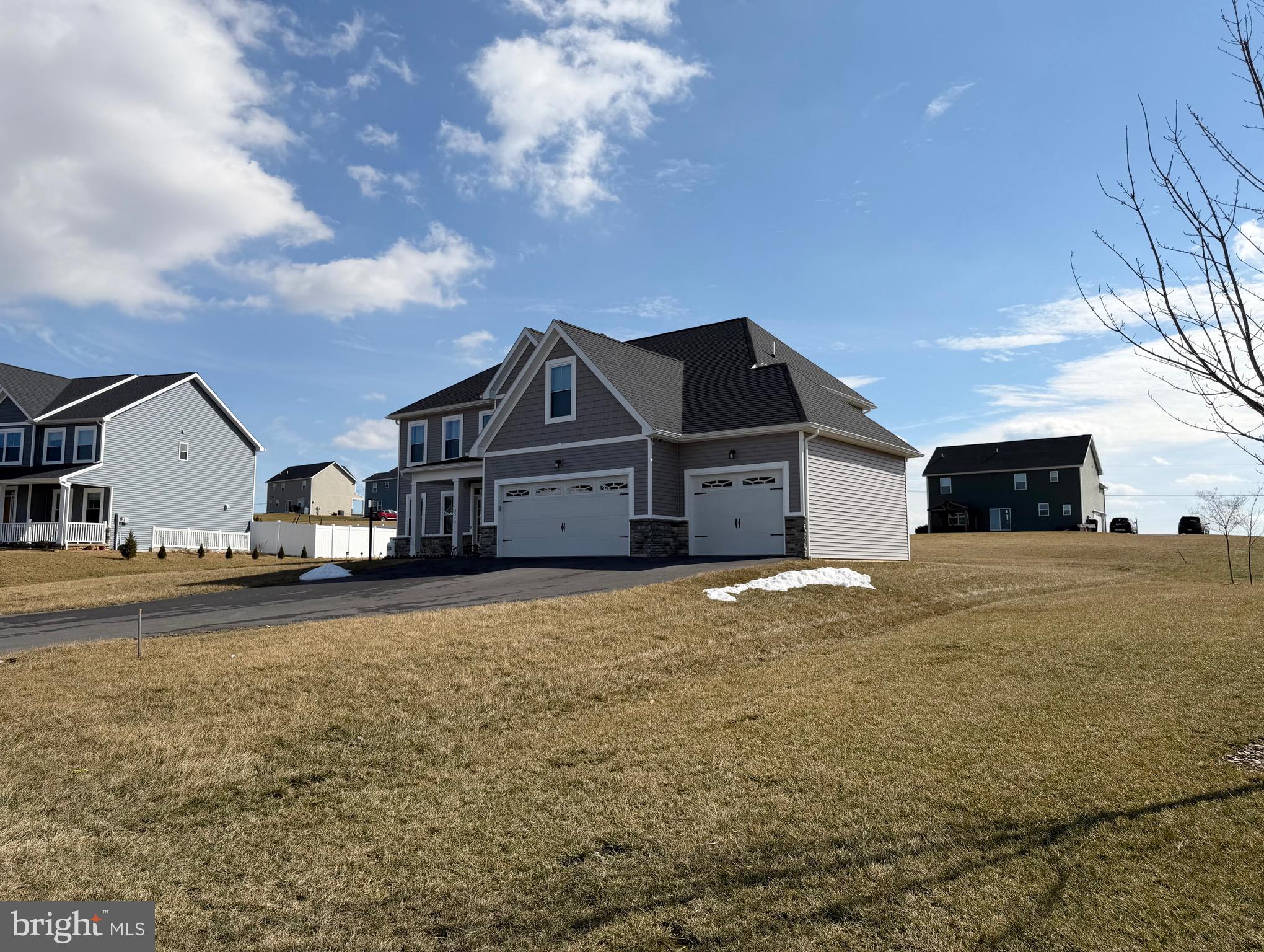 2510 Somerset Road Chambersburg, PA 17202 - Photo 32 of 32 a front view of a house with a yard and garage
