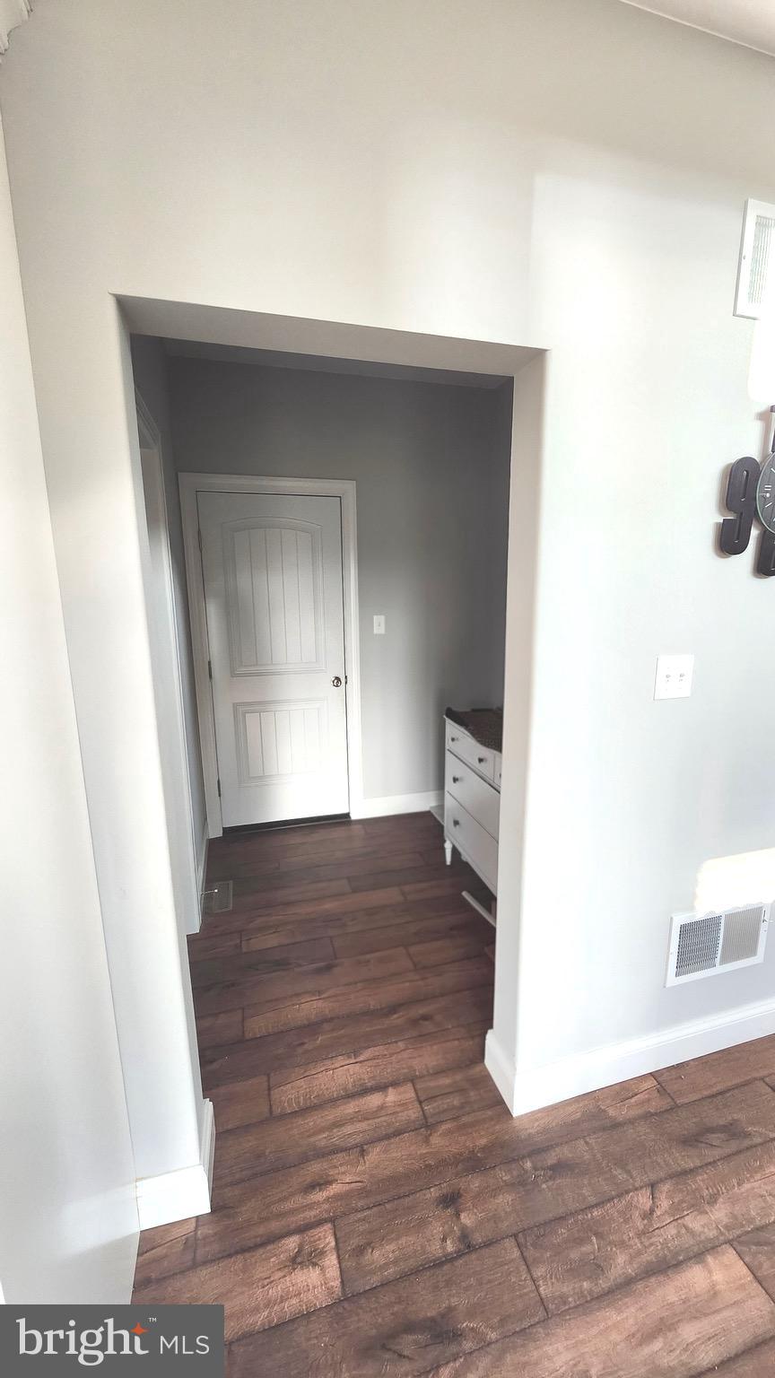 2510 Somerset Road Chambersburg, PA 17202 - Photo 8 of 32 a view of an empty room and wooden floor