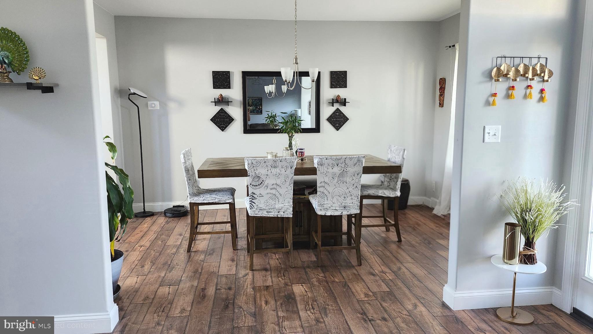 2510 Somerset Road Chambersburg, PA 17202 - Photo 10 of 32 a view of a dining room with furniture and wooden floor
