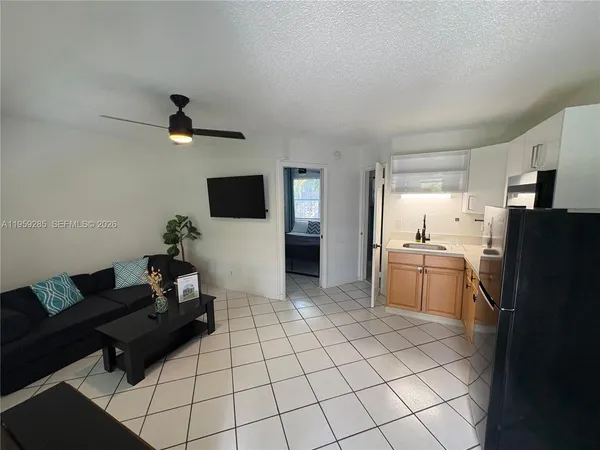 a living room with a couch and a flat screen tv