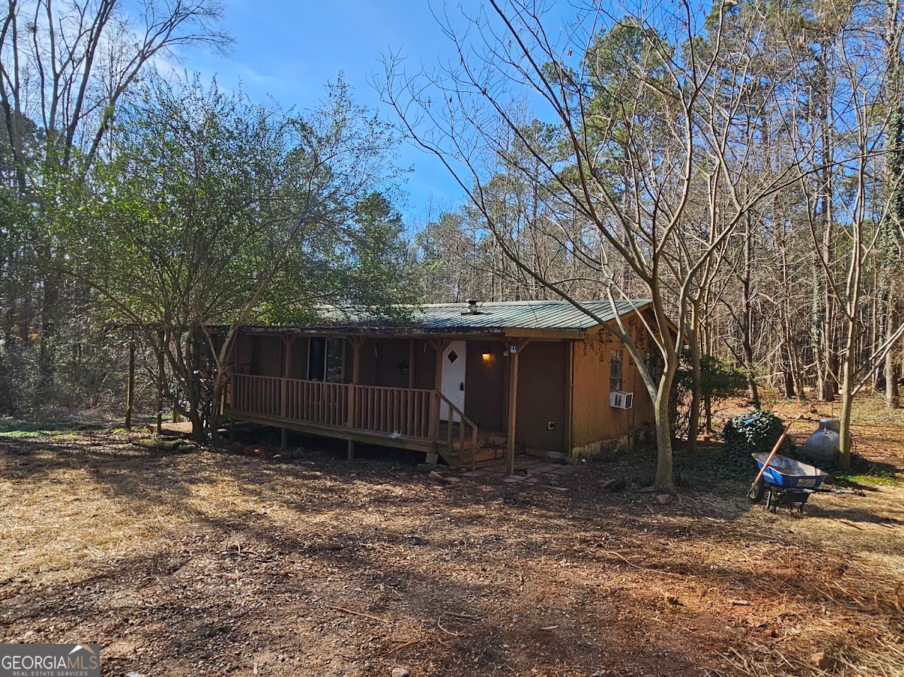 1810 Sandy Flat Road Bowdon, GA 30108 - Photo 7 of 30 a view of a backyard