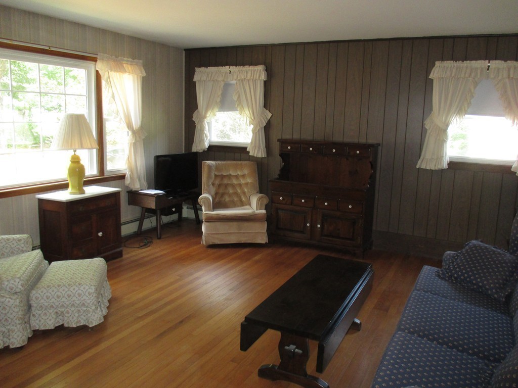 172 Ellis Road Westminster, MA 01473 - Photo 2 of 18 a living room with furniture and a window