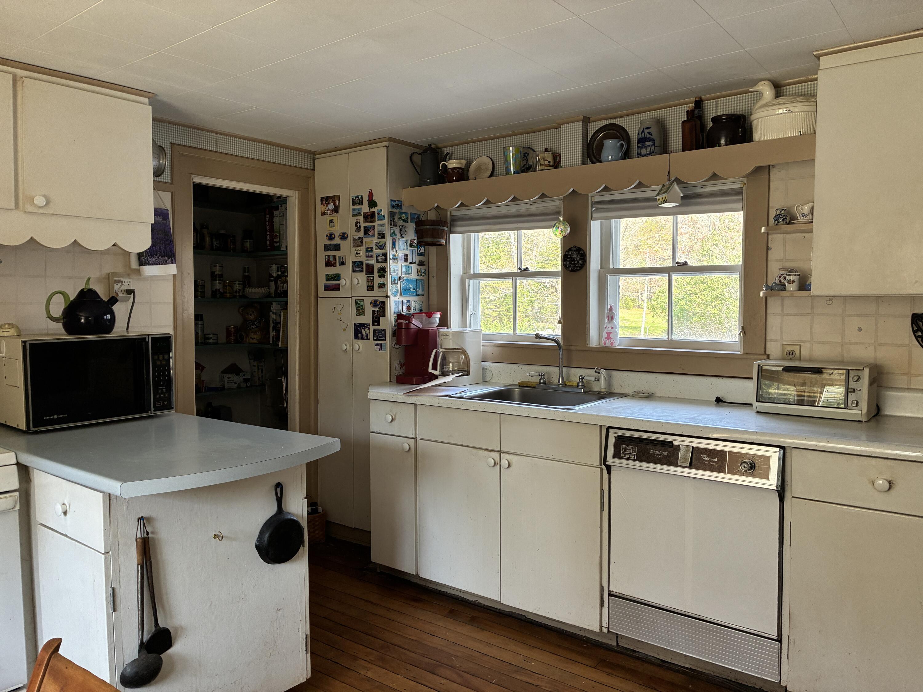 707 Newbury Neck Road Surry, ME 04684 - Photo 7 of 40 Pantry door from kitchen.
