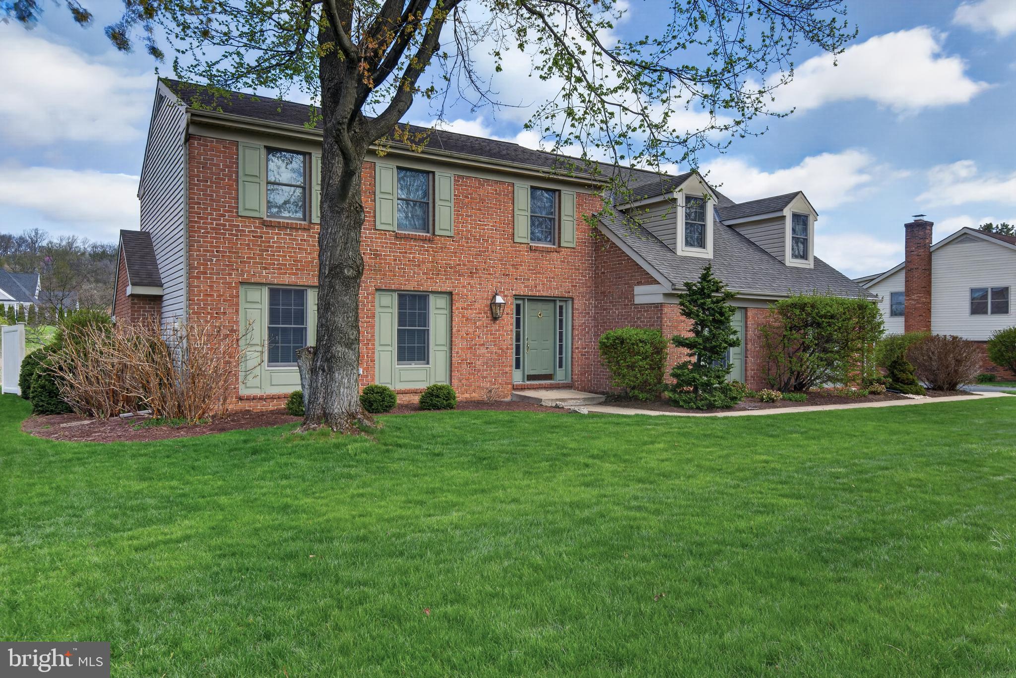 441 Trena Avenue Lancaster, PA 17601 - Photo 2 of 61 a front view of a house with a garden