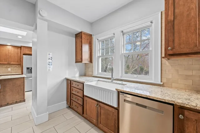 a kitchen with a stove and a refrigerator