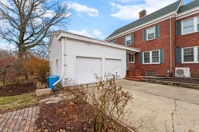 a view of a backyard of white house