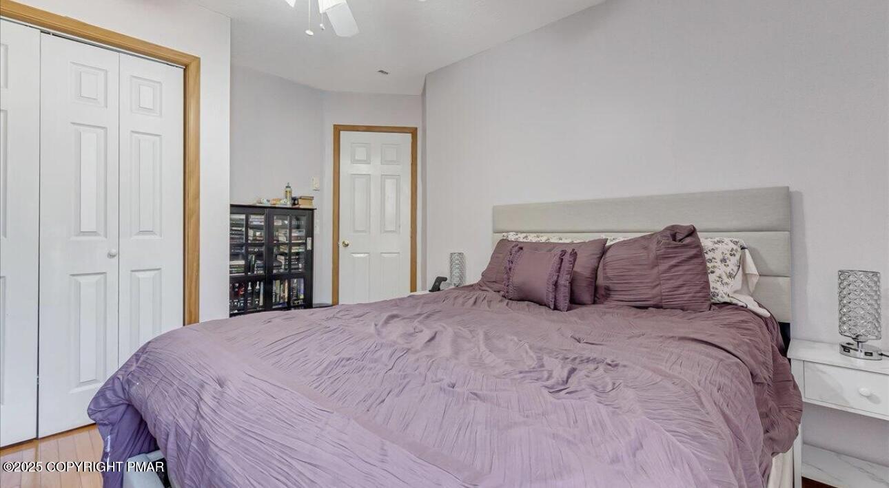 171 Sassafras Road Albrightsville, PA 18210 - Photo 11 of 12 a large bed in a bedroom next to a cabinet