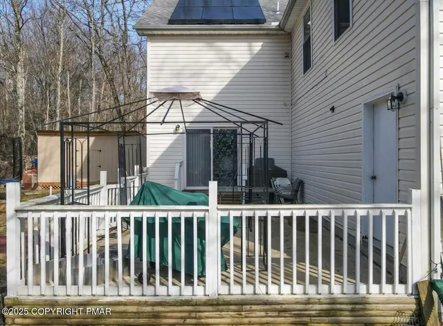 a balcony view with a garden