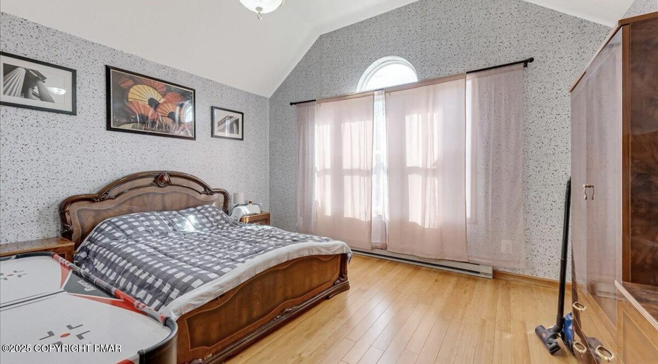 171 Sassafras Road Albrightsville, PA 18210 - Photo 8 of 12 a bedroom with a bed and a window