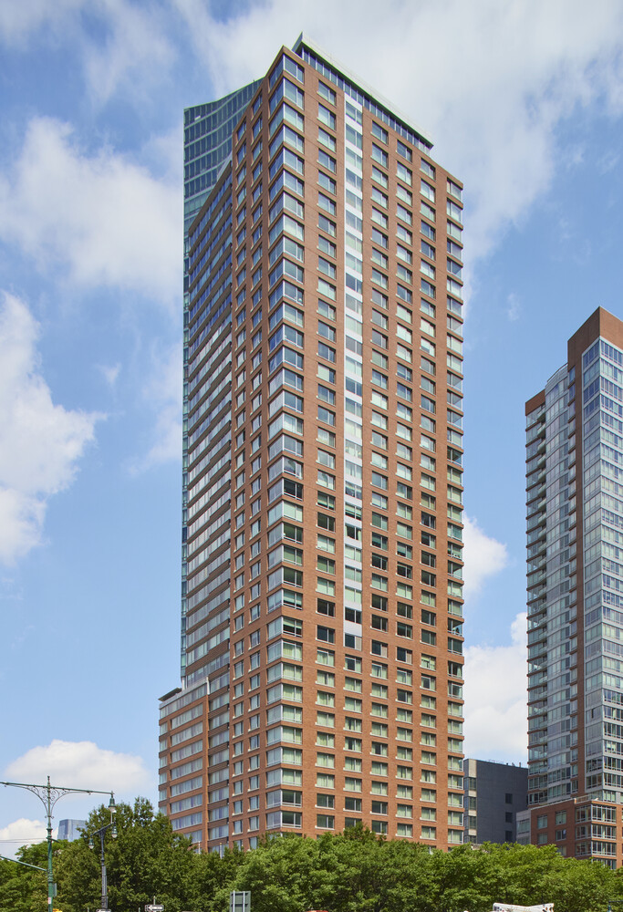 10 West Street, Unit 18A Manhattan, NY 10004 - Photo 10 of 11 a front view of a building