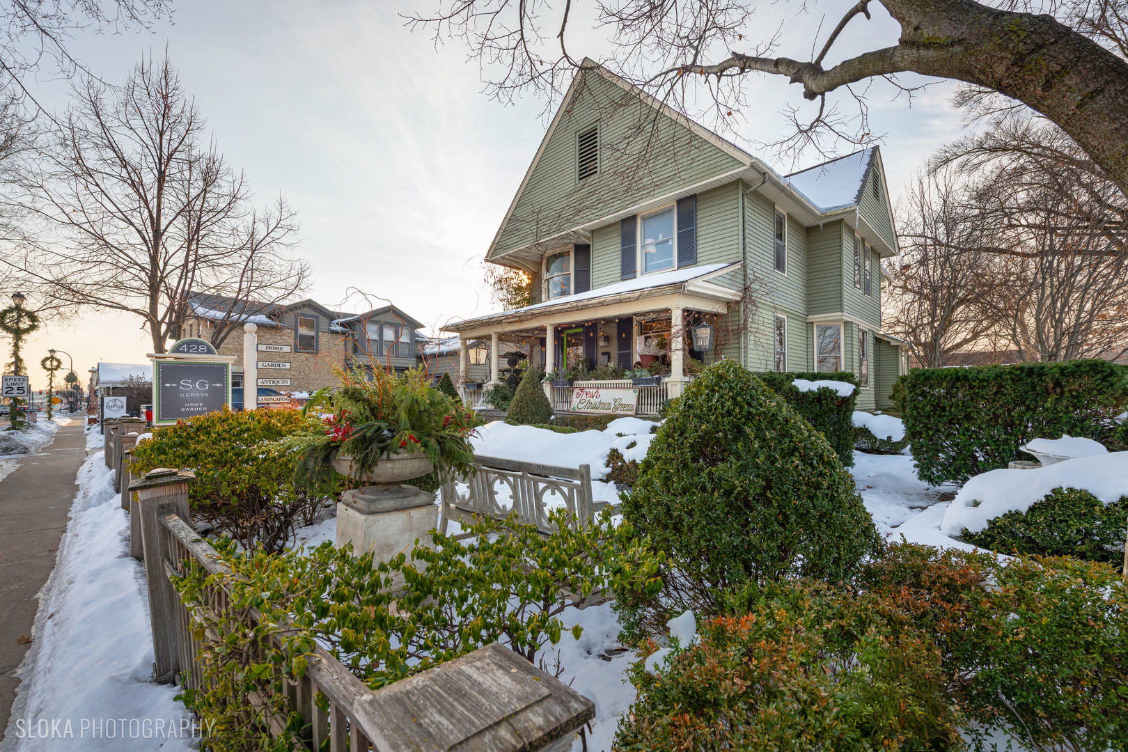 a view of a patio with table and chairs and potted plants