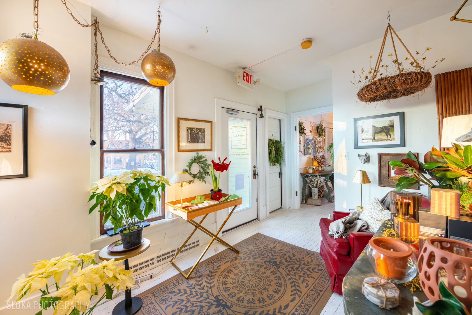 428 West State Street Geneva, IL 60134 - Photo 42 of 61 a living room filled with furniture and a chandelier
