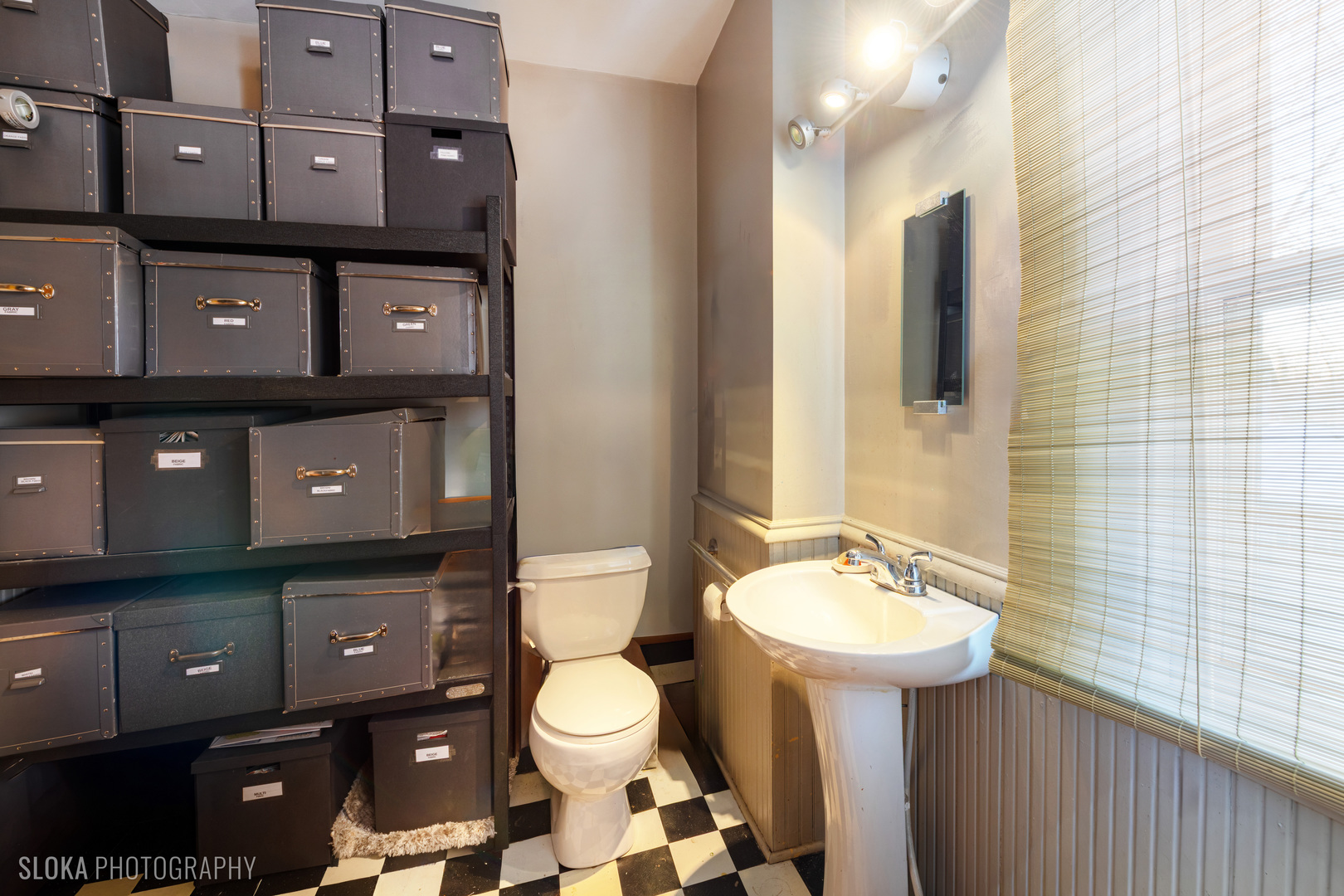 428 West State Street Geneva, IL 60134 - Photo 51 of 61 a bathroom with a toilet sink and mirror