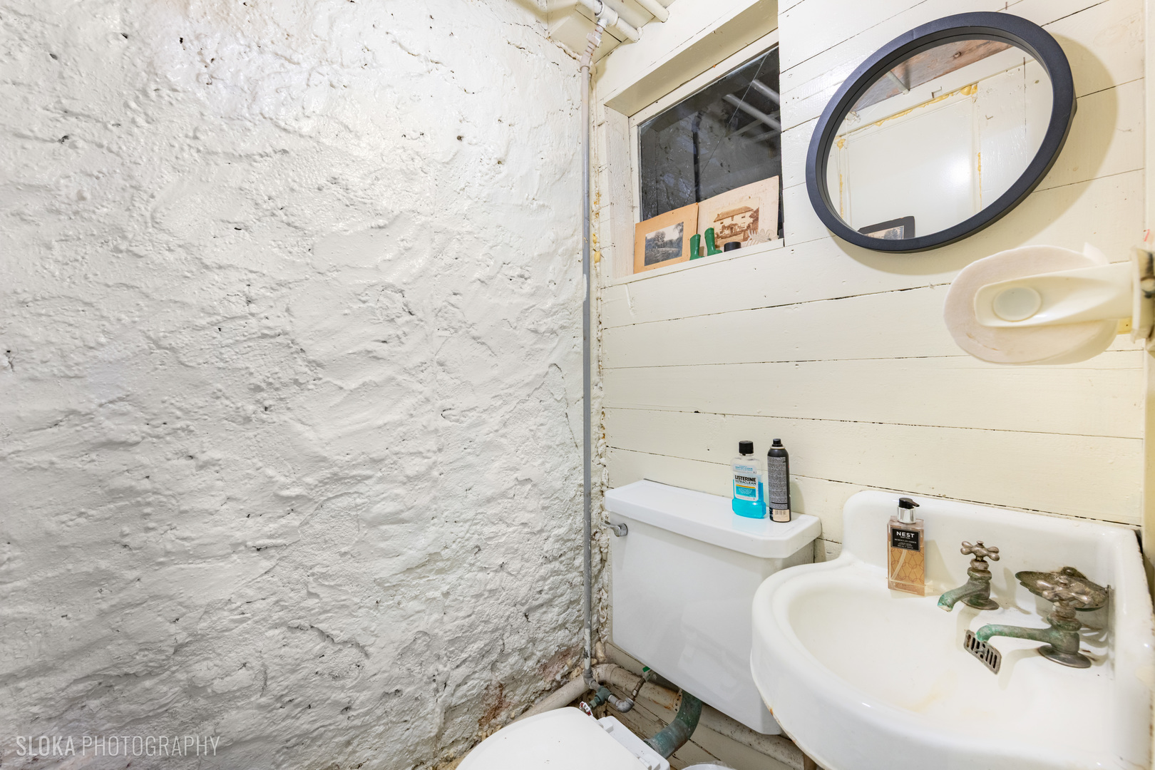 428 West State Street Geneva, IL 60134 - Photo 57 of 61 a bathroom with a sink and a mirror